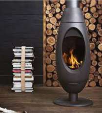 Печь-камин Invicta OVE стальная в интерьере Амазонка бай фото в Молодечно