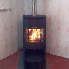 Недорогой камин с отделкой шамотом Сибирь 12 фото в интерьере в Молодечно