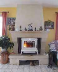 Печь-камин чугунный Invicta Bradford в интерьере Амазонка бай фото в Молодечно