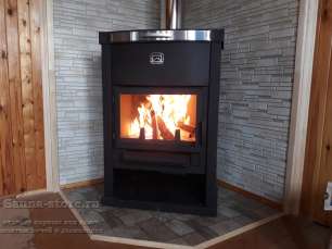 Стальной недорогой камин Теплодар ОВ-120 (угловой) фото в интерьере в Молодечно