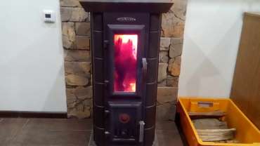 Стальная печь Термофор Статика Тетра, чёрная бронза фото в интерьере в Молодечно