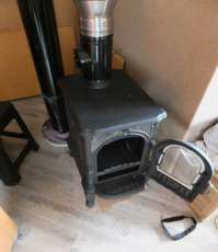 Недорогой печь-камин со стеклом Сибирь 6 фото в интерьере в Молодечно