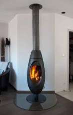 Печь-камин чугунный Invicta Ove в интерьере Амазонка бай фото в Молодечно