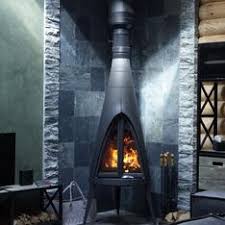 Печь-камин чугунный Invicta Pow-Wow в интерьере Амазонка бай фото в Молодечно