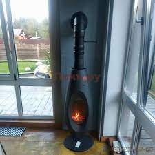 Печь-камин чугунный Invicta OVATIO в интерьере Амазонка бай фото в Молодечно